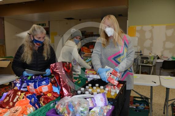 Christmas feature on Maidenhead Foodshare. They are bundling up some food bags to send out today. Maidenhead Food Share, in old Niocholsons Tesco unit