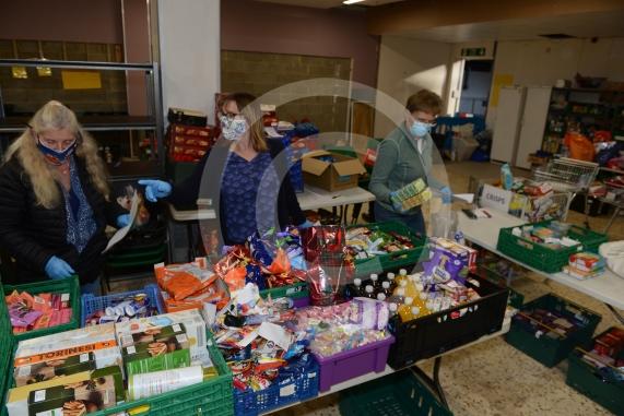 Christmas feature on Maidenhead Foodshare. They are bundling up some food bags to send out today. Maidenhead Food Share, in old Niocholsons Tesco unit
