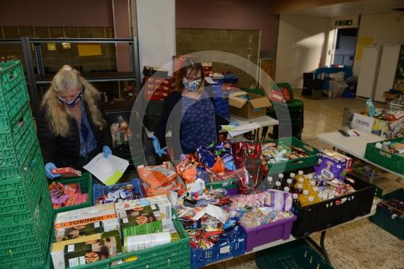 Christmas feature on Maidenhead Foodshare. They are bundling up some food bags to send out today. Maidenhead Food Share, in old Niocholsons Tesco unit