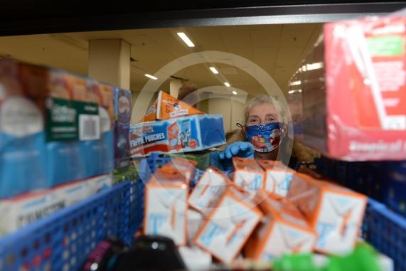 Christmas feature on Maidenhead Foodshare. They are bundling up some food bags to send out today. Maidenhead Food Share, in old Niocholsons Tesco unit