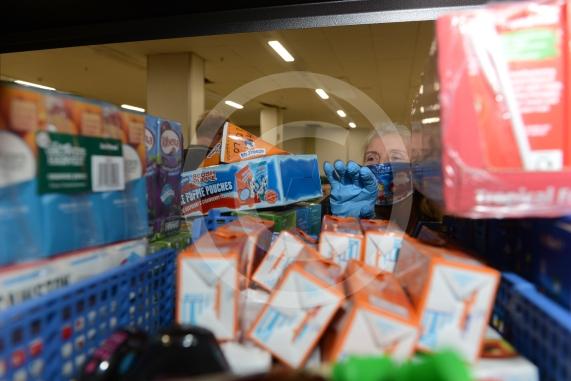Christmas feature on Maidenhead Foodshare. They are bundling up some food bags to send out today. Maidenhead Food Share, in old Niocholsons Tesco unit