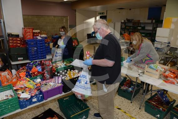 Christmas feature on Maidenhead Foodshare. They are bundling up some food bags to send out today. Maidenhead Food Share, in old Niocholsons Tesco unit