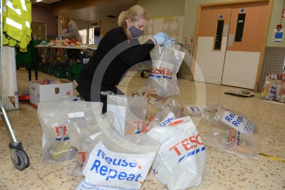 Christmas feature on Maidenhead Foodshare. They are bundling up some food bags to send out today. Maidenhead Food Share, in old Niocholsons Tesco unit