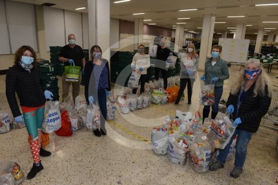 Christmas feature on Maidenhead Foodshare. They are bundling up some food bags to send out today. Maidenhead Food Share, in old Niocholsons Tesco unit