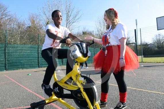 LtoR Marcus, 14 and teacher Alicia Payne.Comic Relief activities.Arbour Vale School, Slough.
