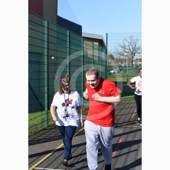 LtoR Specialist Teaching Assistant and Harrison Jacobs, 15.Comic Relief activities.Arbour Vale School, Slough.