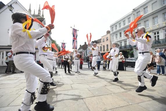 Windsor Guildhall, Windso.  Morris dancers performing on the streets of WindsorRockhopper Morris.