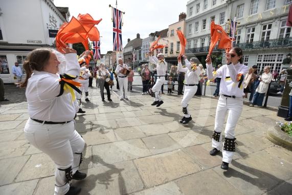 Windsor Guildhall, Windso.  Morris dancers performing on the streets of WindsorRockhopper Morris.