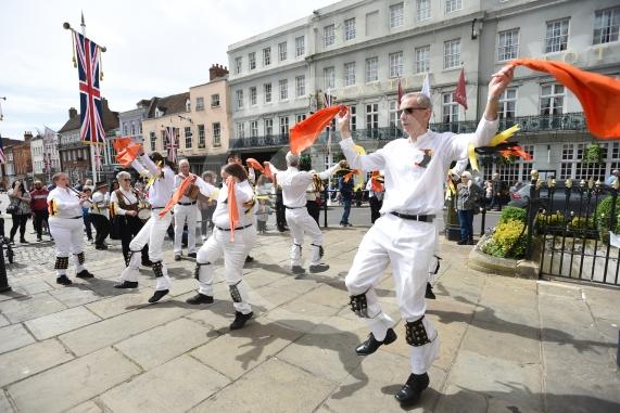 Windsor Guildhall, Windso.  Morris dancers performing on the streets of WindsorRockhopper Morris.