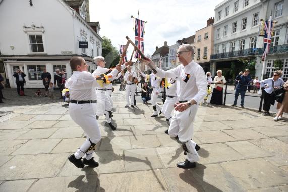 Windsor Guildhall, Windso.  Morris dancers performing on the streets of Windsor