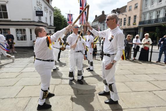 Windsor Guildhall, Windso.  Morris dancers performing on the streets of Windsor
