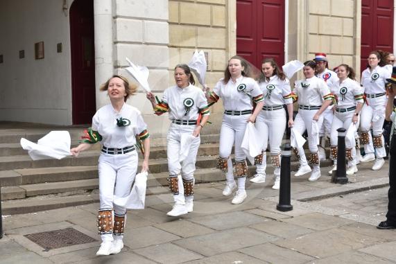 Windsor Guildhall, Windso.  Morris dancers performing on the streets of WindsorWindsor Morris, a female team of dancers founded in 1974.