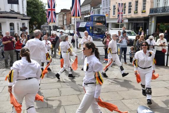 Windsor Guildhall, Windso.  Morris dancers performing on the streets of WindsorRockhopper Morris.
