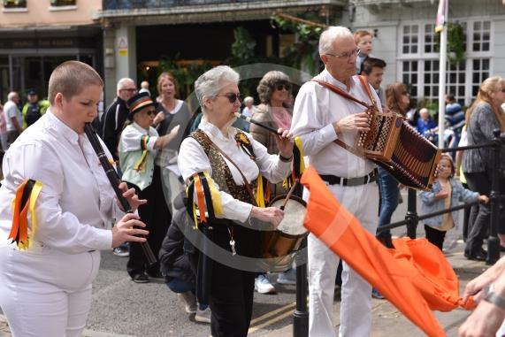 Windsor Guildhall, Windso.  Morris dancers performing on the streets of WindsorRockhopper Morris.