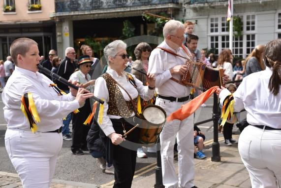 Windsor Guildhall, Windso.  Morris dancers performing on the streets of WindsorRockhopper Morris.