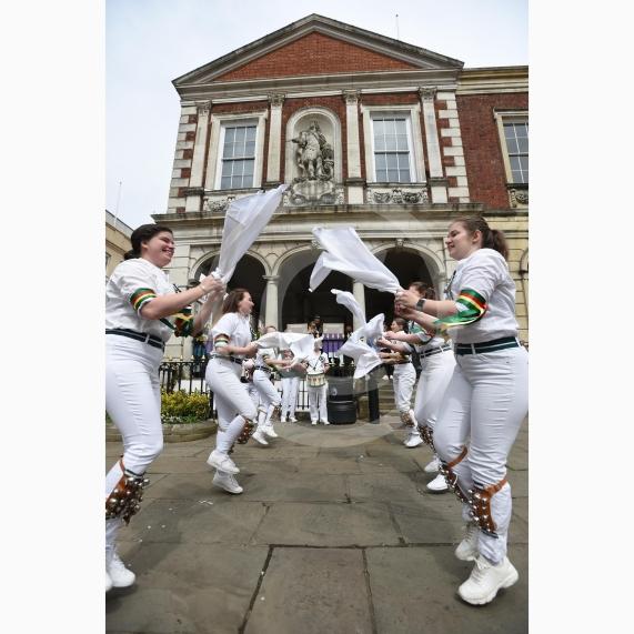 Windsor Guildhall, Windso.  Morris dancers performing on the streets of WindsorWindsor Morris, a female team of dancers founded in 1974.