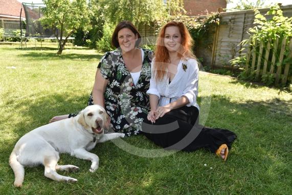 Ukrainian refugee story. Millie Rust-Clarke and Aliona Borysenko. Millie took Aliona in and she was one of the first refugees to arrive from Ukraine into Maidenhead. with Winnie