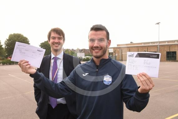 Fraser Quin and teacher Andrew Colmer.A-Level results day.Furze Platt Senior School, Furze Platt Rd, Maidenhead.