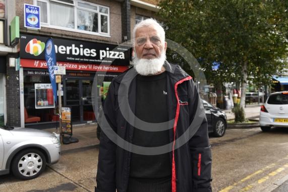 Employee at Herbies Pizza in Farnham Road Abdul Hamid is unhappy about a proposed bus lane along the route planned by the council. He says it will restrict parking for customers and business owners and lead to a loss of trade.Farnham Road, Slough