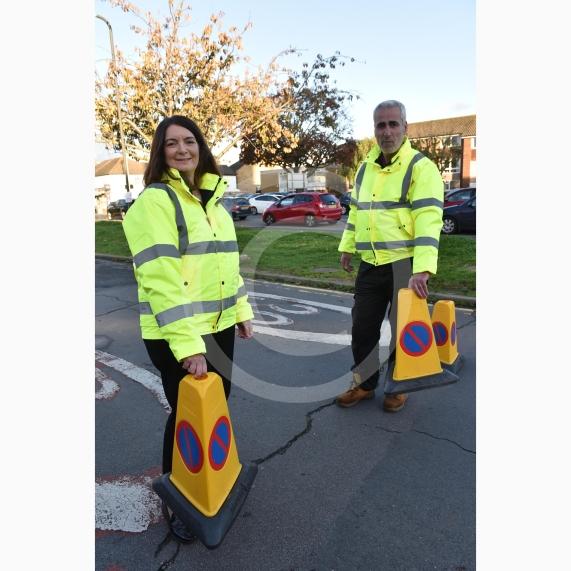 High Street Langley, LangleyHoly Family Catholic School Headteacher Sara Benn and Site Manager Edward Thercaj operating the moveable barriers as part of the School Street scheme. 