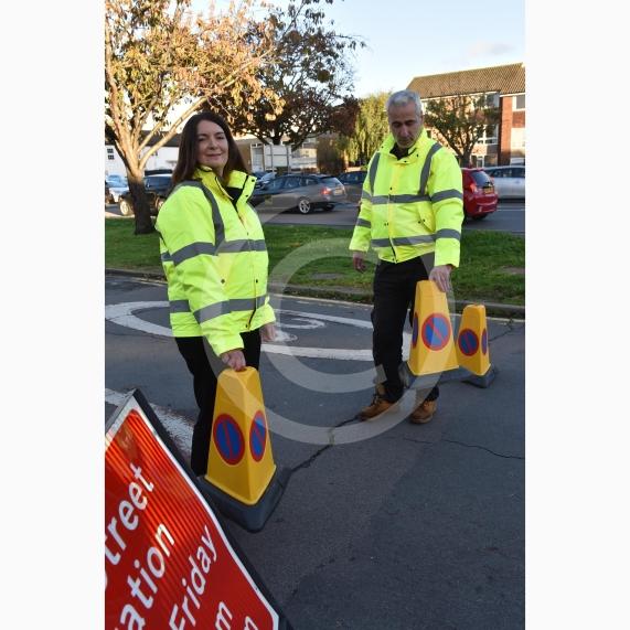 High Street Langley, LangleyHoly Family Catholic School Headteacher Sara Benn and Site Manager Edward Thercaj operating the moveable barriers as part of the School Street scheme. 