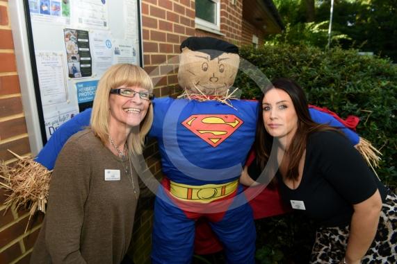 LtoR Deb Heffernan and Donna Heffernan from Twyford Age Concern with their Superman scarecrow.Twyford Scarecrow Trail 2023, Twyford.