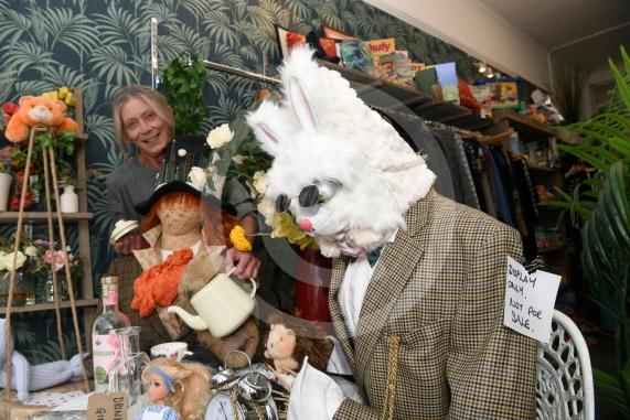 Jenny Buratta at the Mercy in Action charity shop with their Alice in Wonderland Scarecrows.Twyford Scarecrow Trail 2023, Twyford.