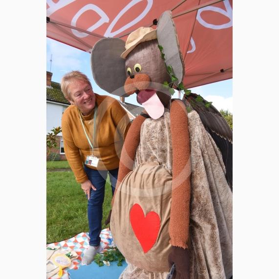 Jayne Kulan from Adopt Thames Valley with their Adoptosaurus.Twyford Scarecrow Trail 2023, Twyford.