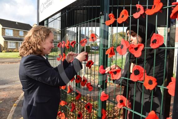 Burnham Grammar School Crochet Club &ndash; poppiesThe school runs a crochet club for students and their current project has been making crocheted poppies for Remembrance Day. Eva Baker 16, Aaminah Zia 16