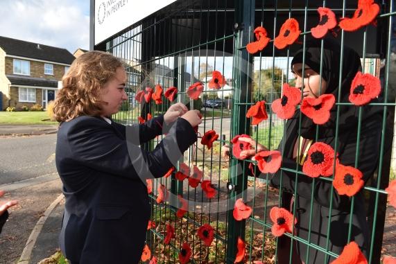 Burnham Grammar School Crochet Club &ndash; poppiesThe school runs a crochet club for students and their current project has been making crocheted poppies for Remembrance Day. Eva Baker 16, Aaminah Zia 16