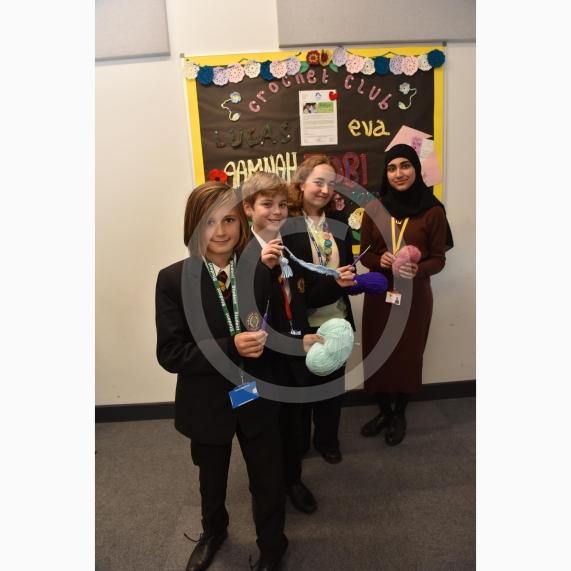 Burnham Grammar School Crochet Club &ndash; poppiesThe school runs a crochet club for students and their current project has been making crocheted poppies for Remembrance Day.L-R Tobi Dunk 11,  John Weeks 11, Eva Baker 16, Aaminah Zia 16