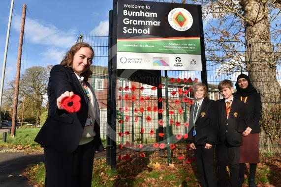 Burnham Grammar School Crochet Club &ndash; poppiesThe school runs a crochet club for students and their current project has been making crocheted poppies for Remembrance Day.L-R Eva Baker 16, Tobi Dunk 11, John Weeks 11, Aaminah Zia 16