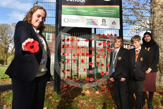 Burnham Grammar School Crochet Club &ndash; poppiesThe school runs a crochet club for students and their current project has been making crocheted poppies for Remembrance Day.L-R Eva Baker 16, Tobi Dunk 11, John Weeks 11, Aaminah Zia 16