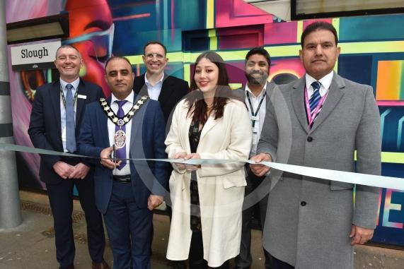 Slough Hub is unveiling a mural at Slough Station. The artist is Jho 
