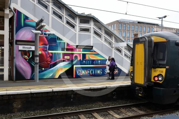 Slough Hub is unveiling a mural at Slough Station. The artist is Jho 