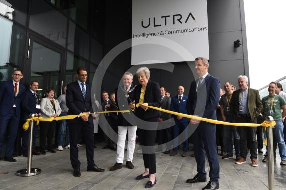 Ultra Intelligence & Communications (Ultra I&C) will be opening their Cyber Centre of Excellence in Maidenhead. Ultra Intelligence & Communications, Building 1, Foundation Park, Maidenhead, Berkshire, SL6 3UD L-R Shonnel Malani, Chairman of the Board Ultra Electronics,  RBWM Mayor Neil Knowles, Rt Hon Theresa May MP, Richard Dingley, UK President of Ultra intelligence & Communications Cyber