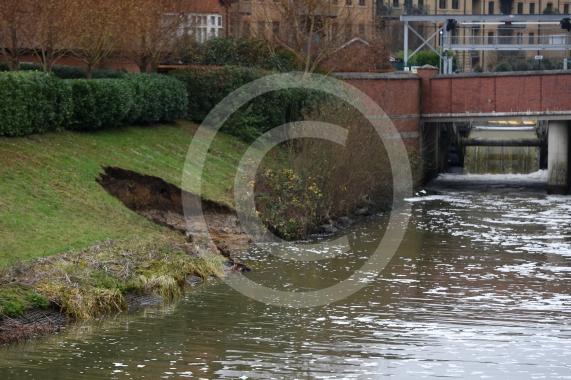 The Environment Agency is dropping 100 tonnes of rocks from a helicopter onto the embankments of the Jubilee River, Maidenhead. The channel has suffered from erosion due to recent storms and the rocks are planned to fix this.