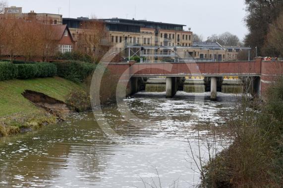 The Environment Agency is dropping 100 tonnes of rocks from a helicopter onto the embankments of the Jubilee River, Maidenhead. The channel has suffered from erosion due to recent storms and the rocks are planned to fix this.