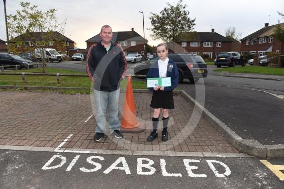 Matt Cottrell is irate with the police because they tried to get his disabled daughter’s parking bay removed. Hare Shoots, Maidenhead, SL62SE