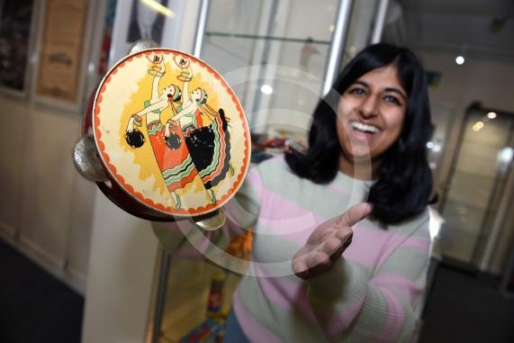 Maidenhead Heritage Centre.Photo of their new exhibition- Toys of Yesteryear that is launching on Friday. Heritage centre manager Semila with tamborine.