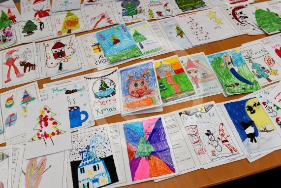 In the officeMP Josh Reynolds picking out his Christmas card winners