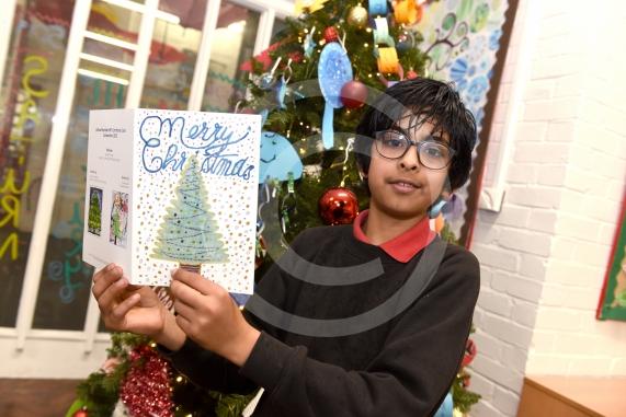 St Luke&rsquo;s Primary School, Cookham Road, MaidenheadJosh Reynolds with the Xmas card comp winner, Ayaan Shenoy 9