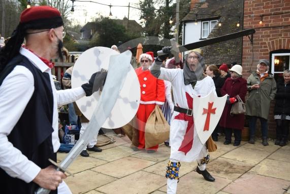 Mummers Play at the Dewdrop Inn in HurleyEllington Morris performing their traditional Mummers play on Boxing Day at two local pubs. The play features St.George and the Turkish fighting to the death and a Doctor and his wondrous horse then bringing the slain St.George back to life, assisted by Molly, Father Christmas, Jack Finney and Beelzebub. The side also collects donations for the Maidenhead Mencap Monday Club. 