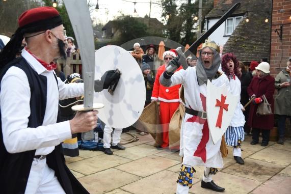Mummers Play at the Dewdrop Inn in HurleyEllington Morris performing their traditional Mummers play on Boxing Day at two local pubs. The play features St.George and the Turkish fighting to the death and a Doctor and his wondrous horse then bringing the slain St.George back to life, assisted by Molly, Father Christmas, Jack Finney and Beelzebub. The side also collects donations for the Maidenhead Mencap Monday Club. 