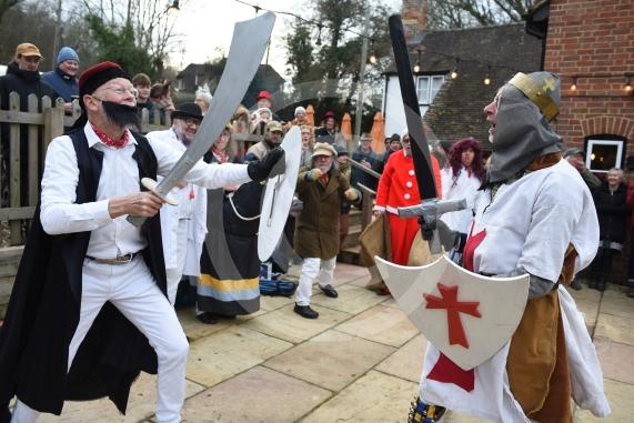 Mummers Play at the Dewdrop Inn in HurleyEllington Morris performing their traditional Mummers play on Boxing Day at two local pubs. The play features St.George and the Turkish fighting to the death and a Doctor and his wondrous horse then bringing the slain St.George back to life, assisted by Molly, Father Christmas, Jack Finney and Beelzebub. The side also collects donations for the Maidenhead Mencap Monday Club. 