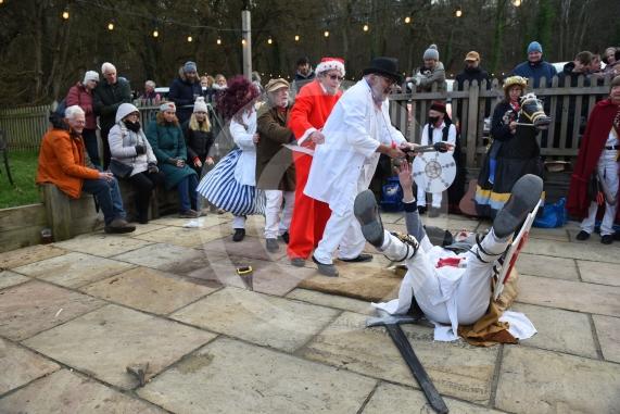 Mummers Play at the Dewdrop Inn in HurleyEllington Morris performing their traditional Mummers play on Boxing Day at two local pubs. The play features St.George and the Turkish fighting to the death and a Doctor and his wondrous horse then bringing the slain St.George back to life, assisted by Molly, Father Christmas, Jack Finney and Beelzebub. The side also collects donations for the Maidenhead Mencap Monday Club. 