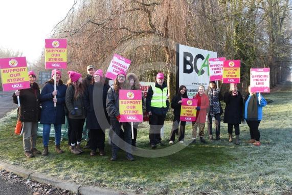 Staff are going on strike at three Windsor Forest College Group sites in Berkshire. Striking staff on the picket line outside BCA