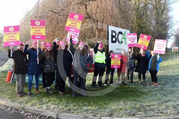 Staff are going on strike at three Windsor Forest College Group sites in Berkshire. Striking staff on the picket line outside BCA