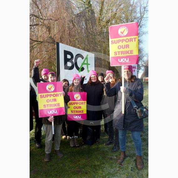 Staff are going on strike at three Windsor Forest College Group sites in Berkshire. Striking staff on the picket line outside BCA