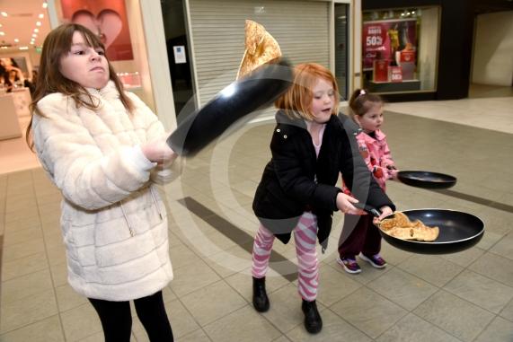 Nicholsons Centre,  MaidenheadPancake Day, Shrove Tuesday&lsquo;Flip the Pancake &ndash; get a prize!&rsquo;L-R Eva Kisby 11, Adeliene Bryant 7, aoibhe Jennings 3
